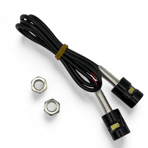 Two black compact LED lights with threaded mounting studs, wires and fixing nuts.